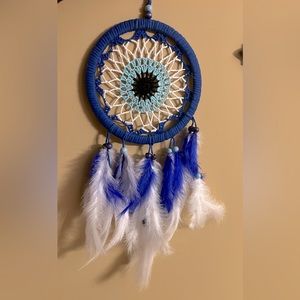 Embrace Positivity and ward off negativity with this Evil Eye dream catcher!